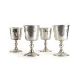 A set of four silver goblets of typical form, Garrard & Co. Ltd., London 1968, h.