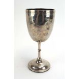 A Victorian silver trophy goblet, later decorated with foliate motifs, maker IH TH, London 1872, h.