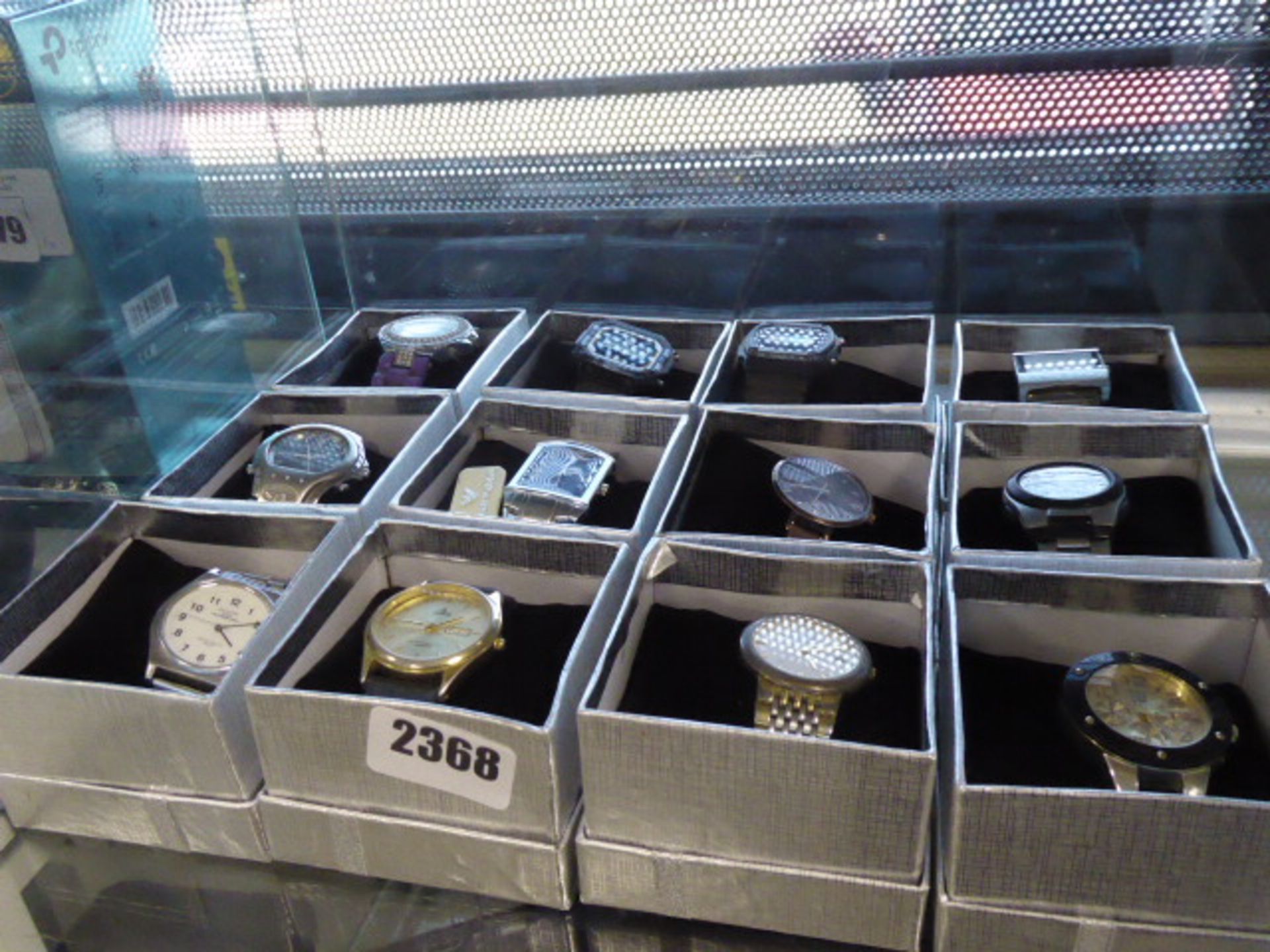 Twelve various boxed ladies and gents wrist watches, to include Lorus, Sekonda, Armani etc