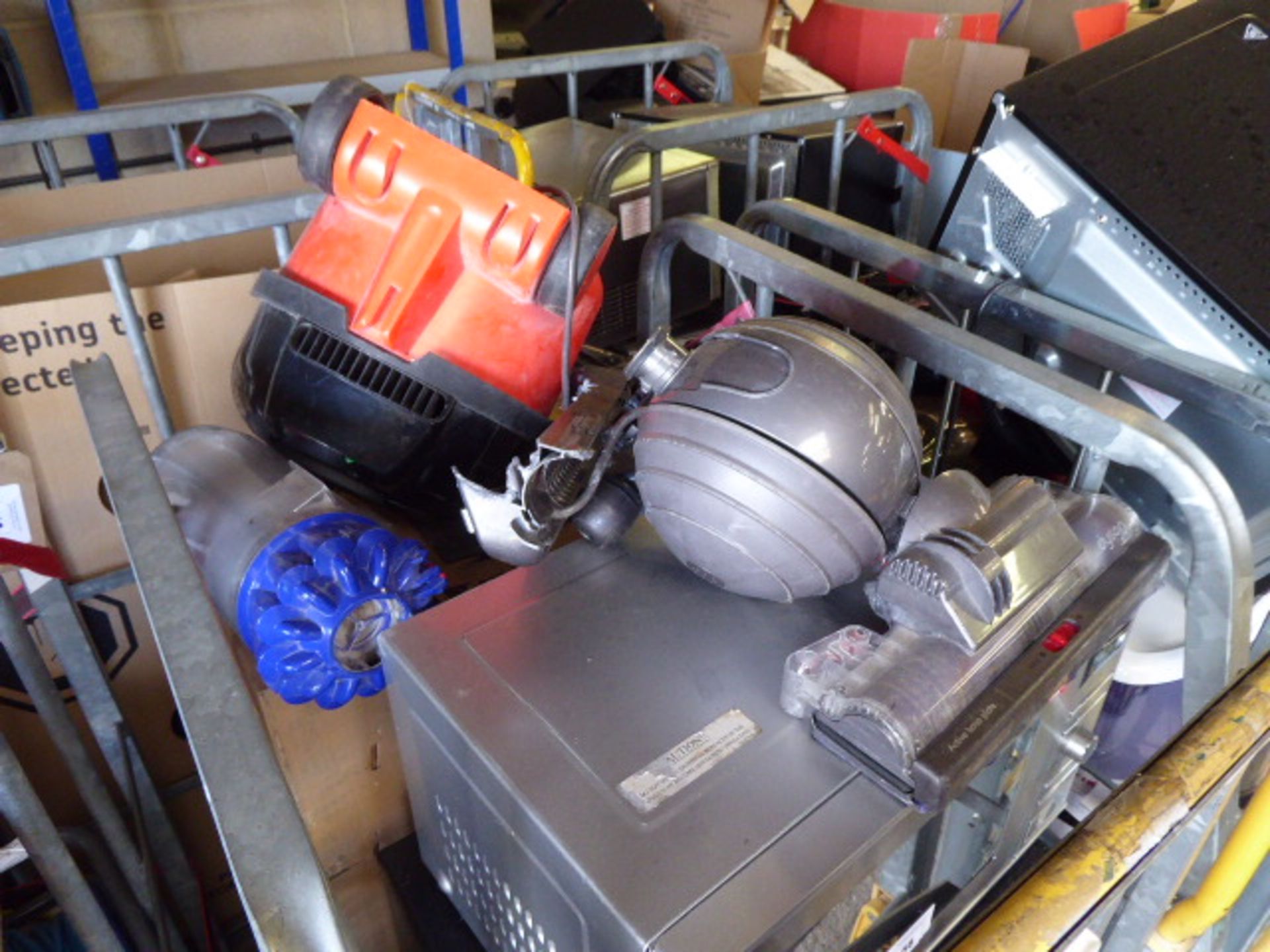 Failed electric safety items suitable for spares or repair only to include 7 microwave ovens,