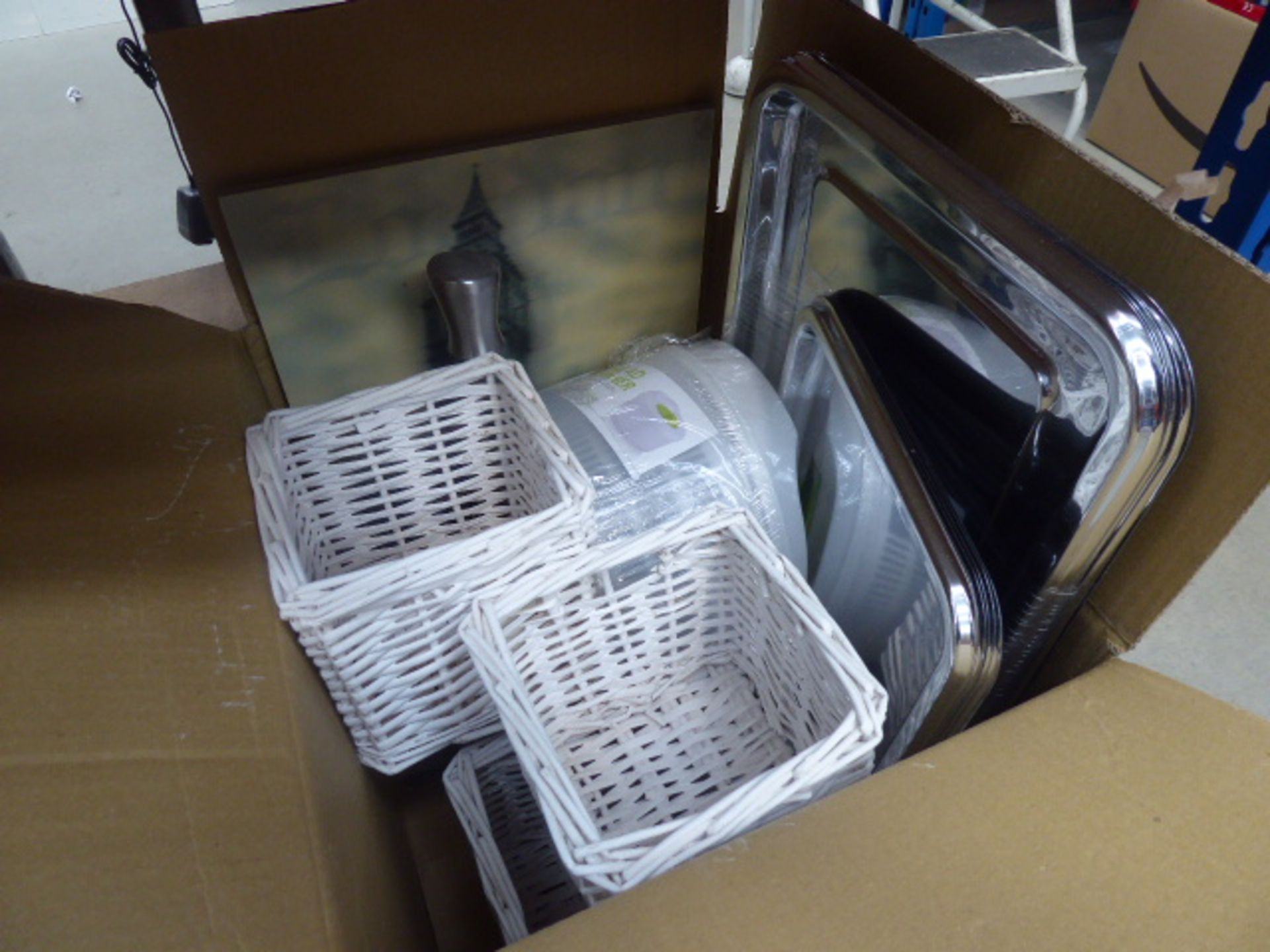 Box containing containing a salad spinner, serving trays, small storage boxes, etc