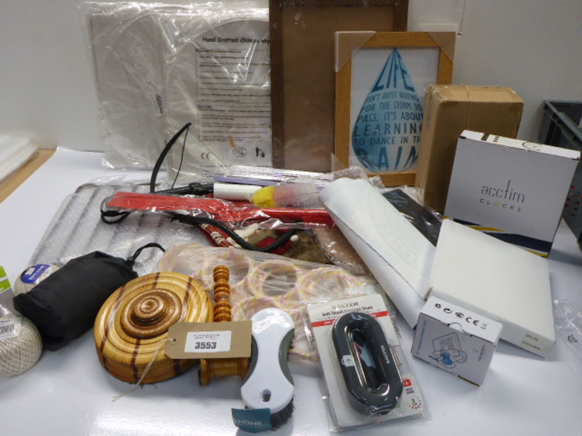 Chinese sky lanterns, picture frames, auctioneer gavel, mains adapter, luggage scale and household