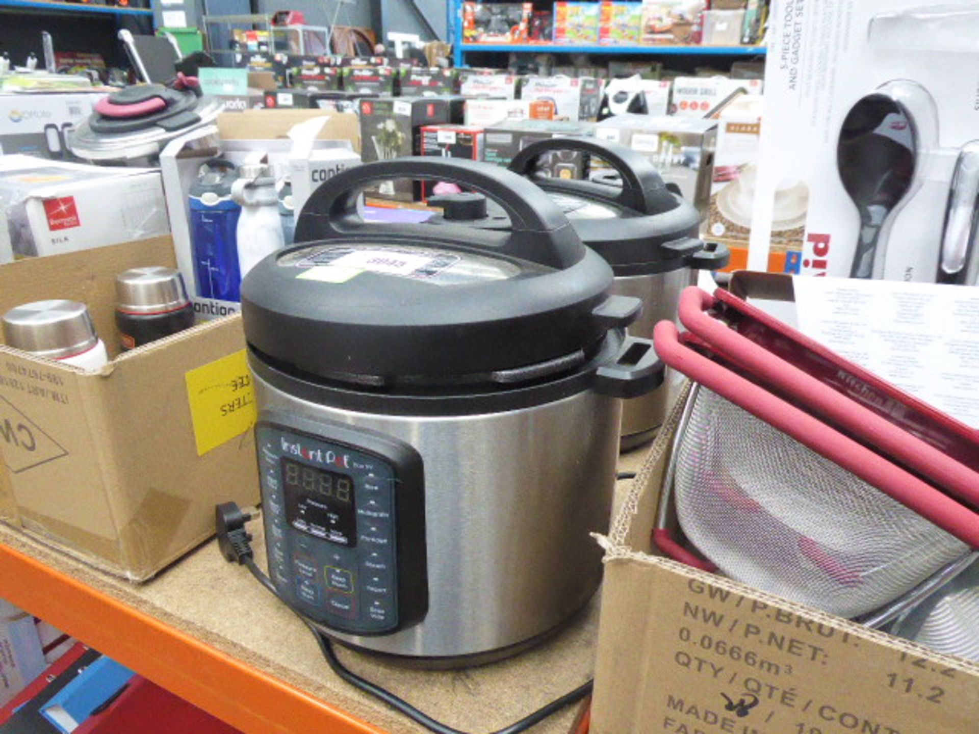 2 unboxed instant pot pressure cookers