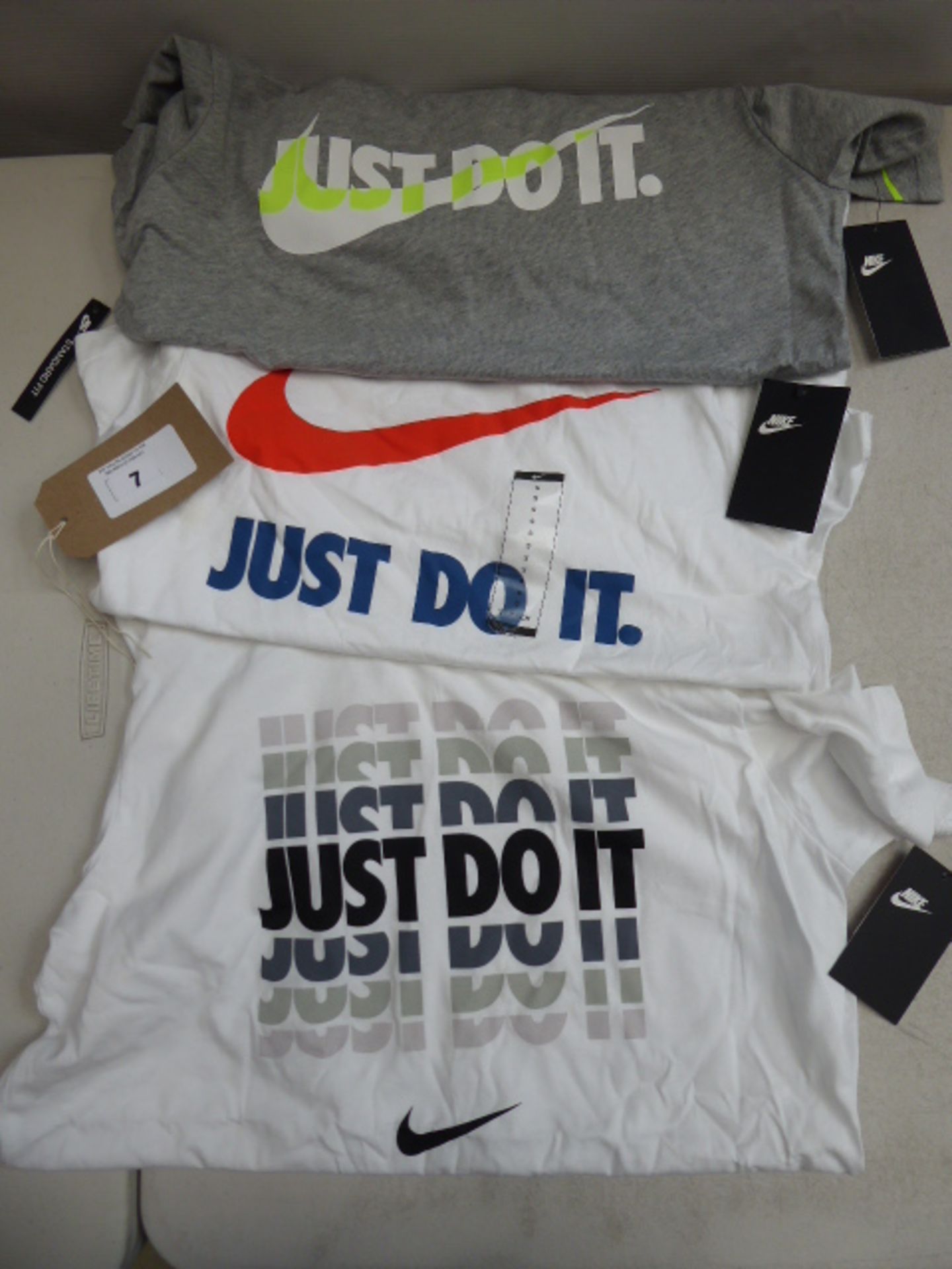 Three Nike Just Do It t-shirts sizes small, medium and large