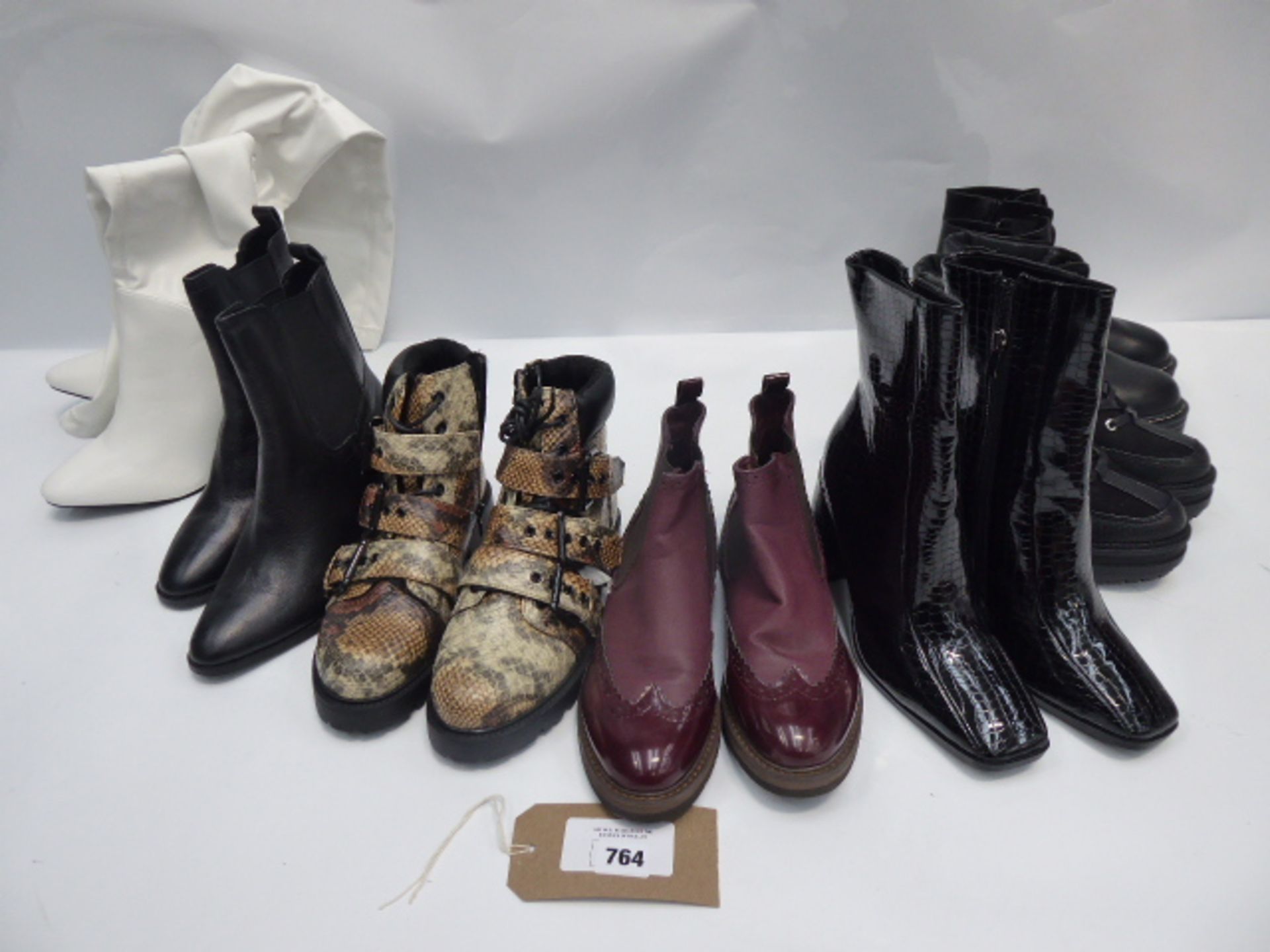 A selection of high and low heeled boots with brands including Pull & Bear, Koi Footwear, River