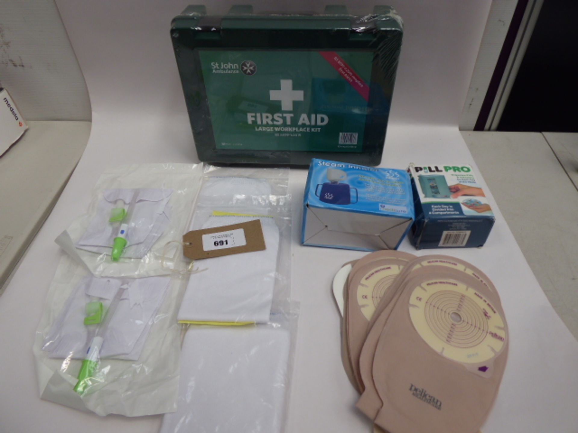 Bag containing medical accessories; First Aid Large Workplace Kit, Pelican Healthcare Stoma Bags,