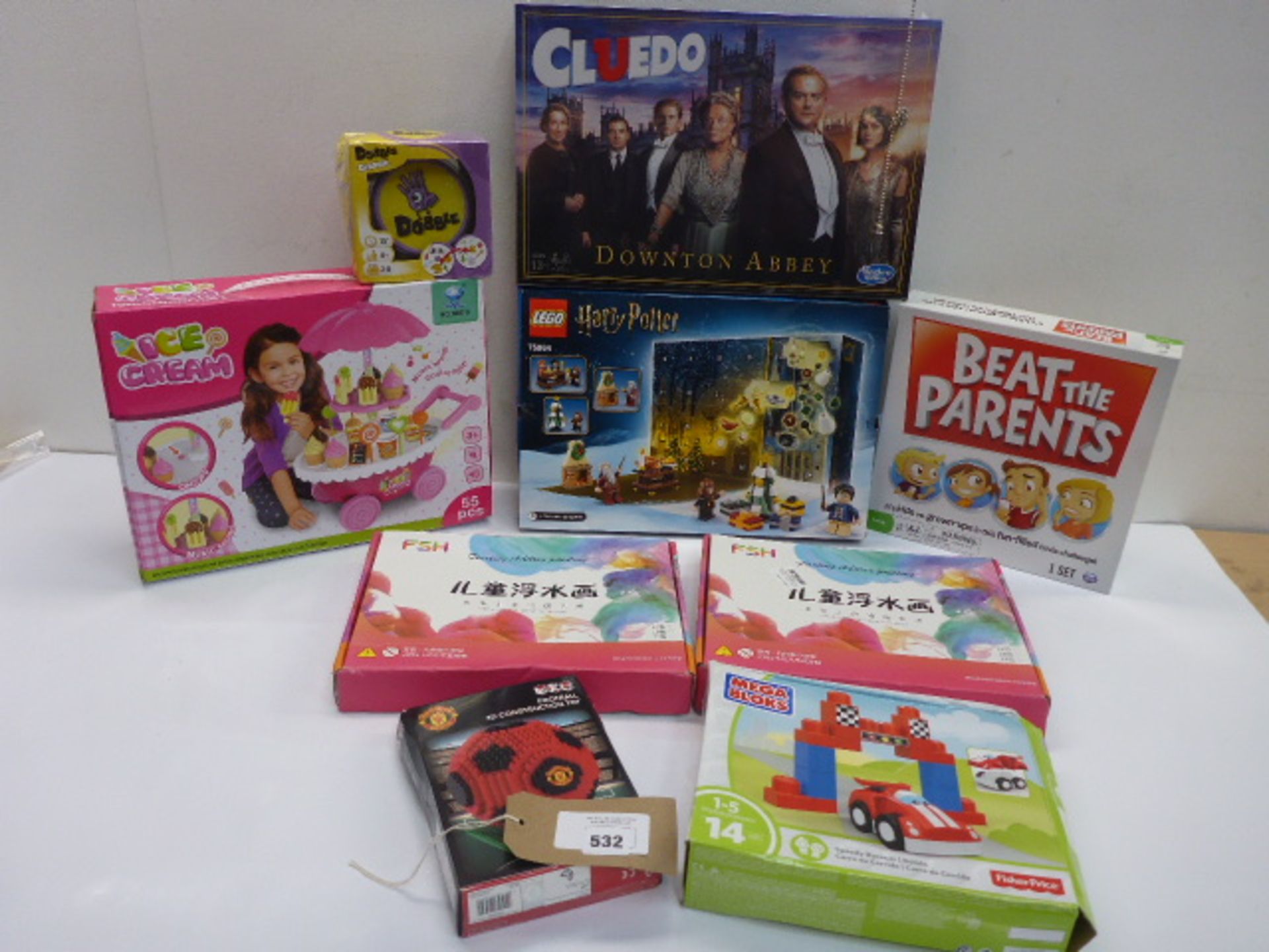 9 boxed games including Dobble, Cluedo, Beat This Parents, Lego Harry Potter Advent Calendar etc