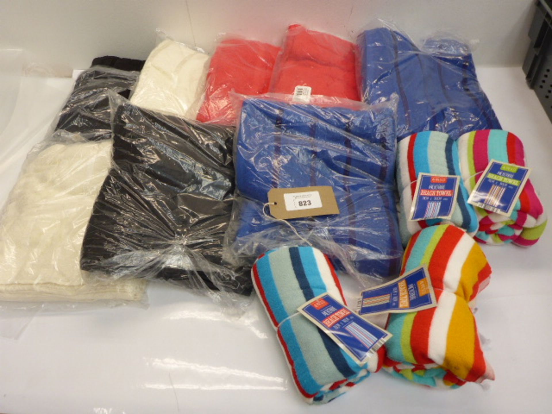 8 assorted colour bath towels and 4 microfibre multi colour beach towels