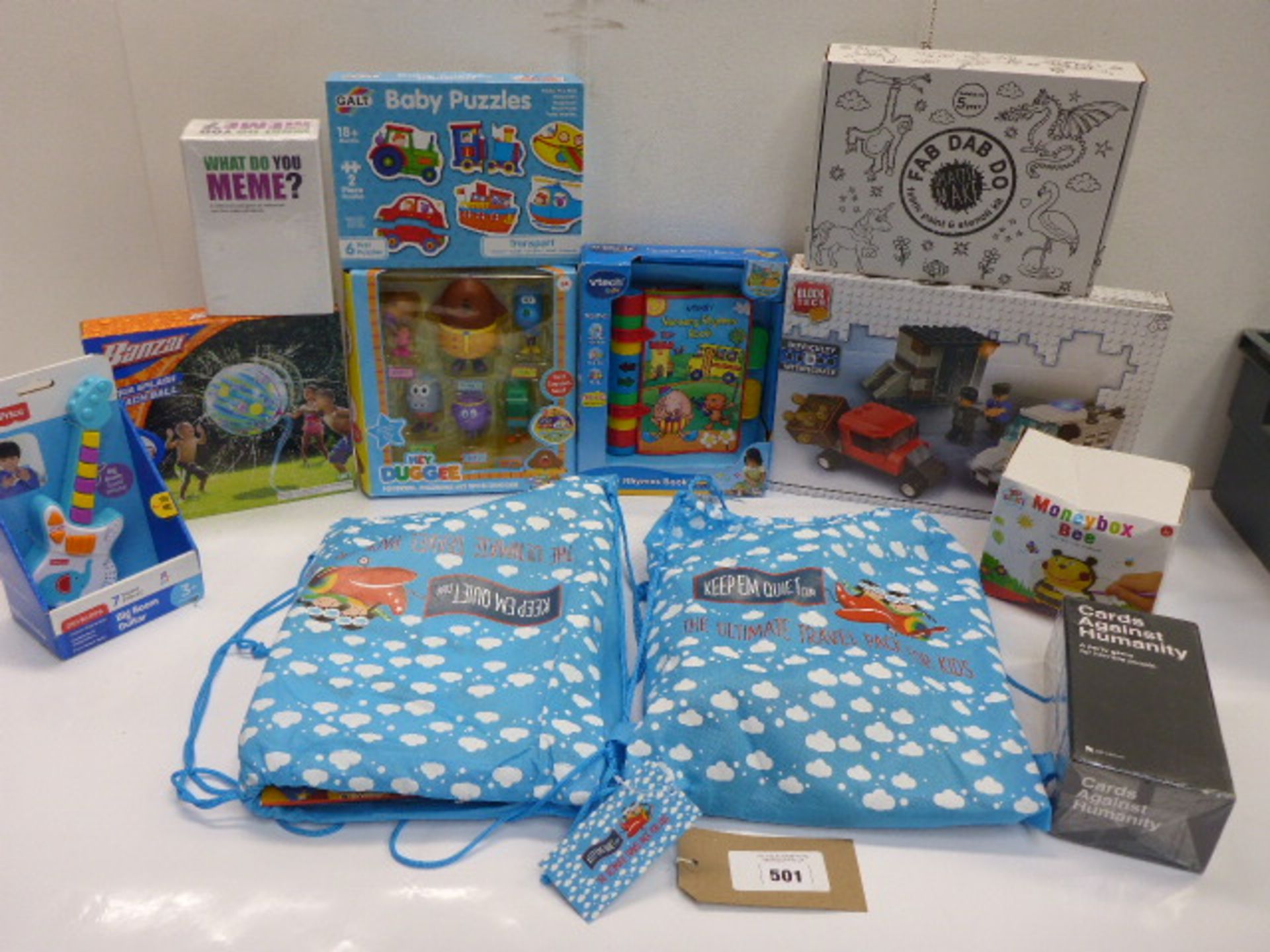 12 toys & games including Ultimate Travel packs, Cards Against Humanity, Vtech rhymes book, Block