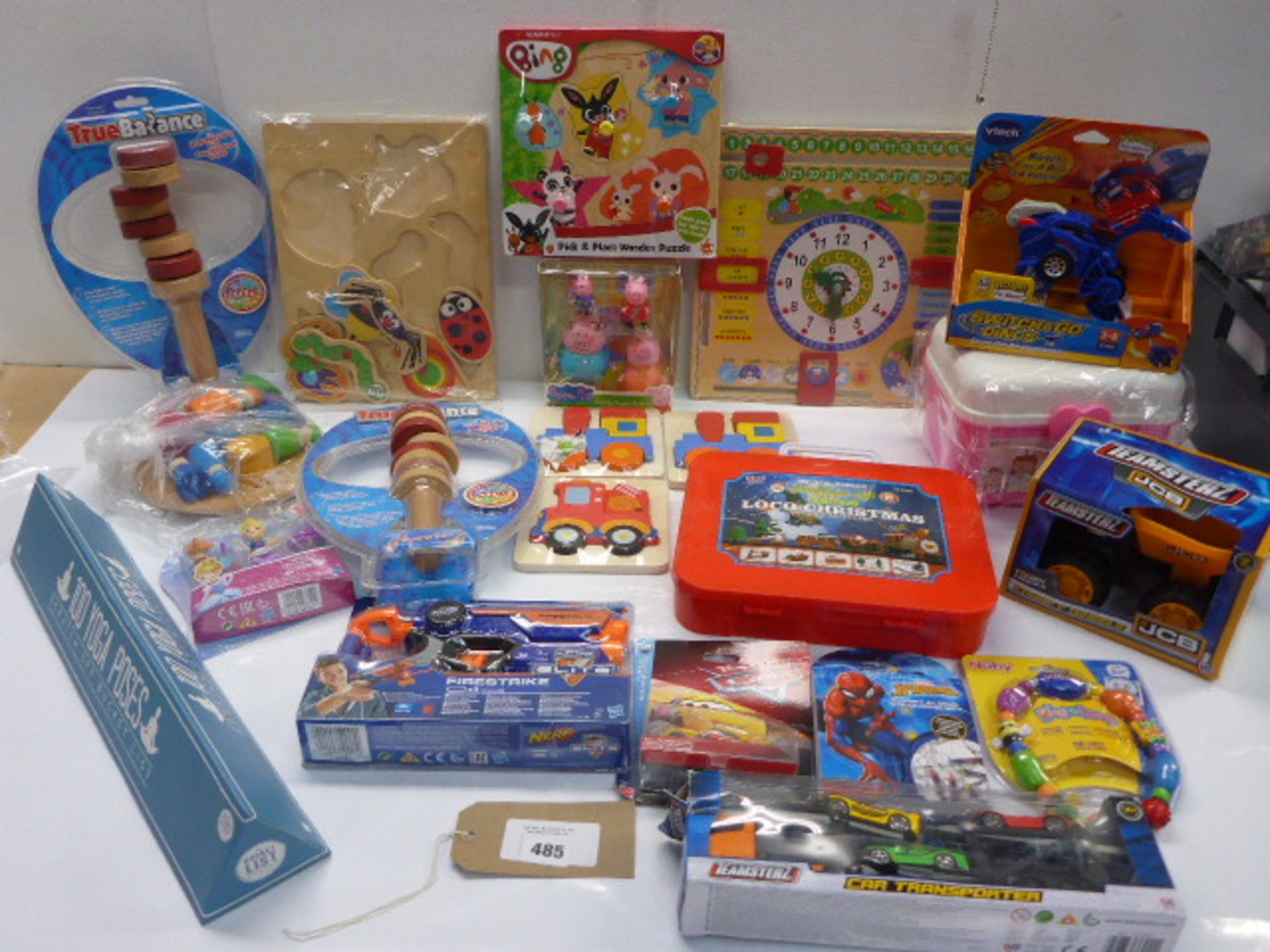 Large quantity of toys & games including Vtech Switch & Go Dino, wooden shape puzzles, Nerf gun, car