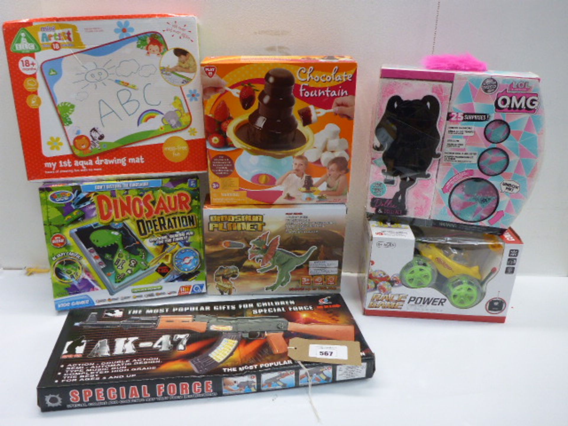 7 boxed games including LOL, r/c power car, Dinosaur Planet, Dinosaur Operation, Chocolate Fountain,