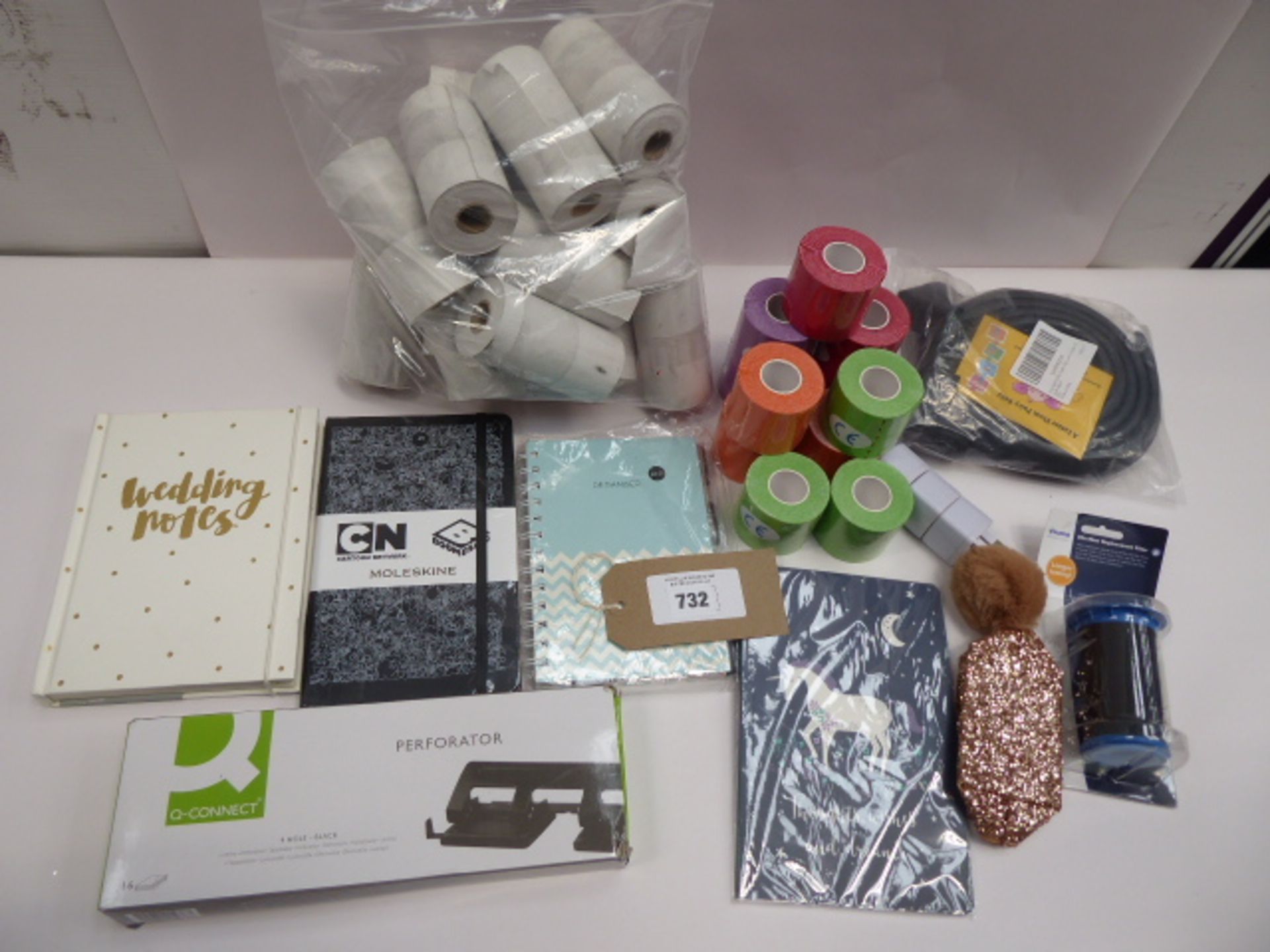 Large quantity of till roll, notepads/books, Q-Connect Perforator, adhesive coloured fabric, plug