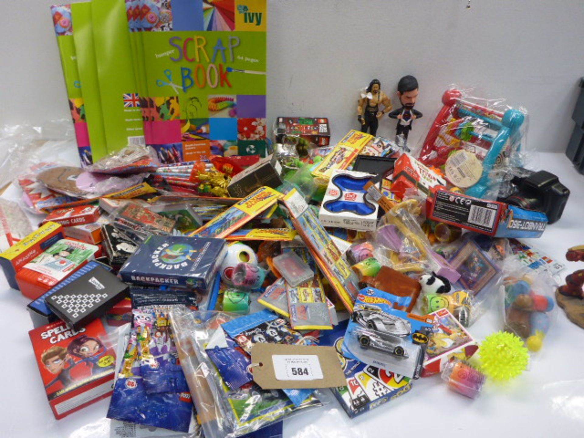 Large bag of novelty toys, Lego miniatures, scrap books, action figures, card games, gliders etc