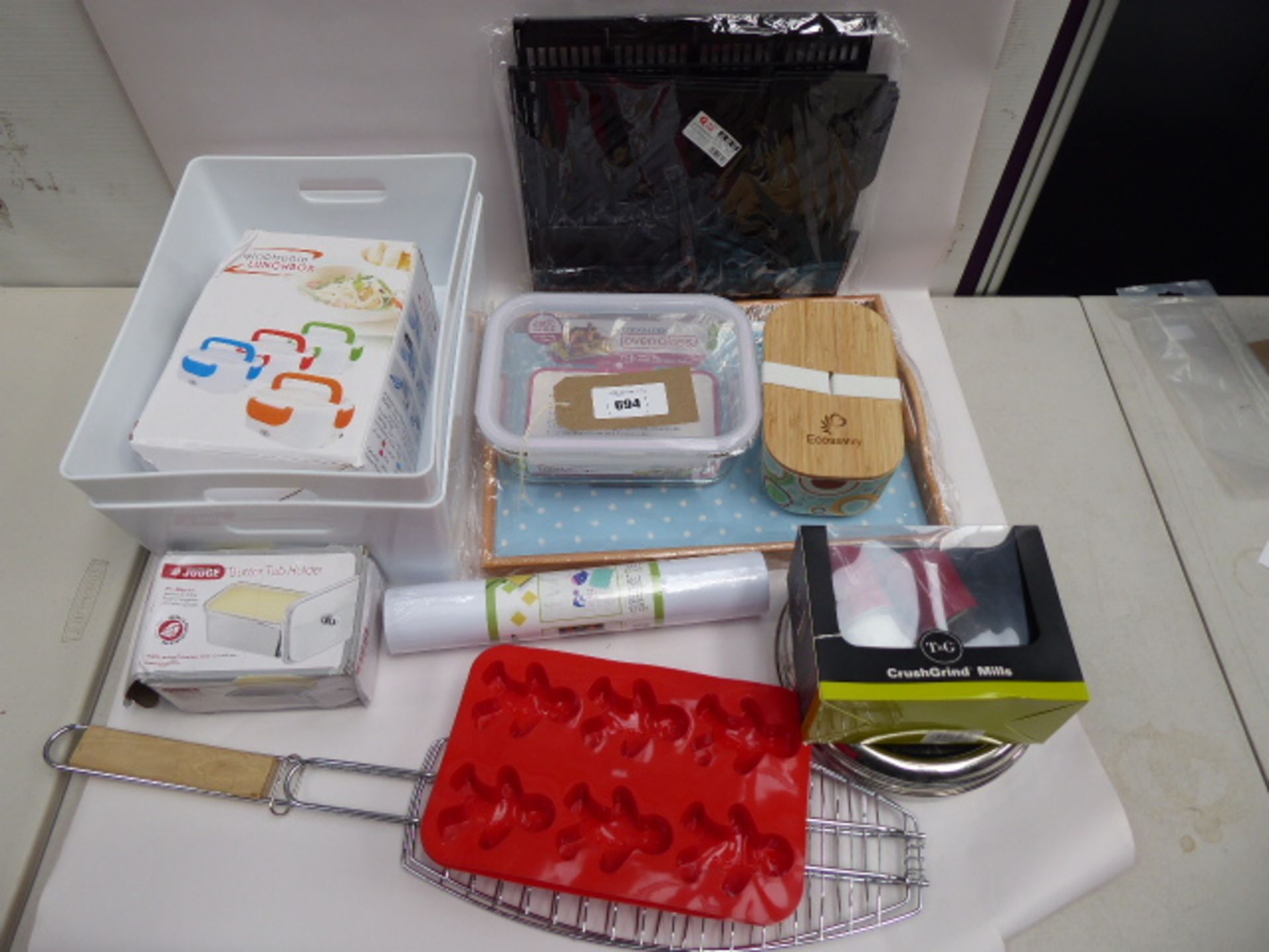 Consignment of kitchenlia; storage boxes, salt and pepper grinders, tray, jelly molds etc