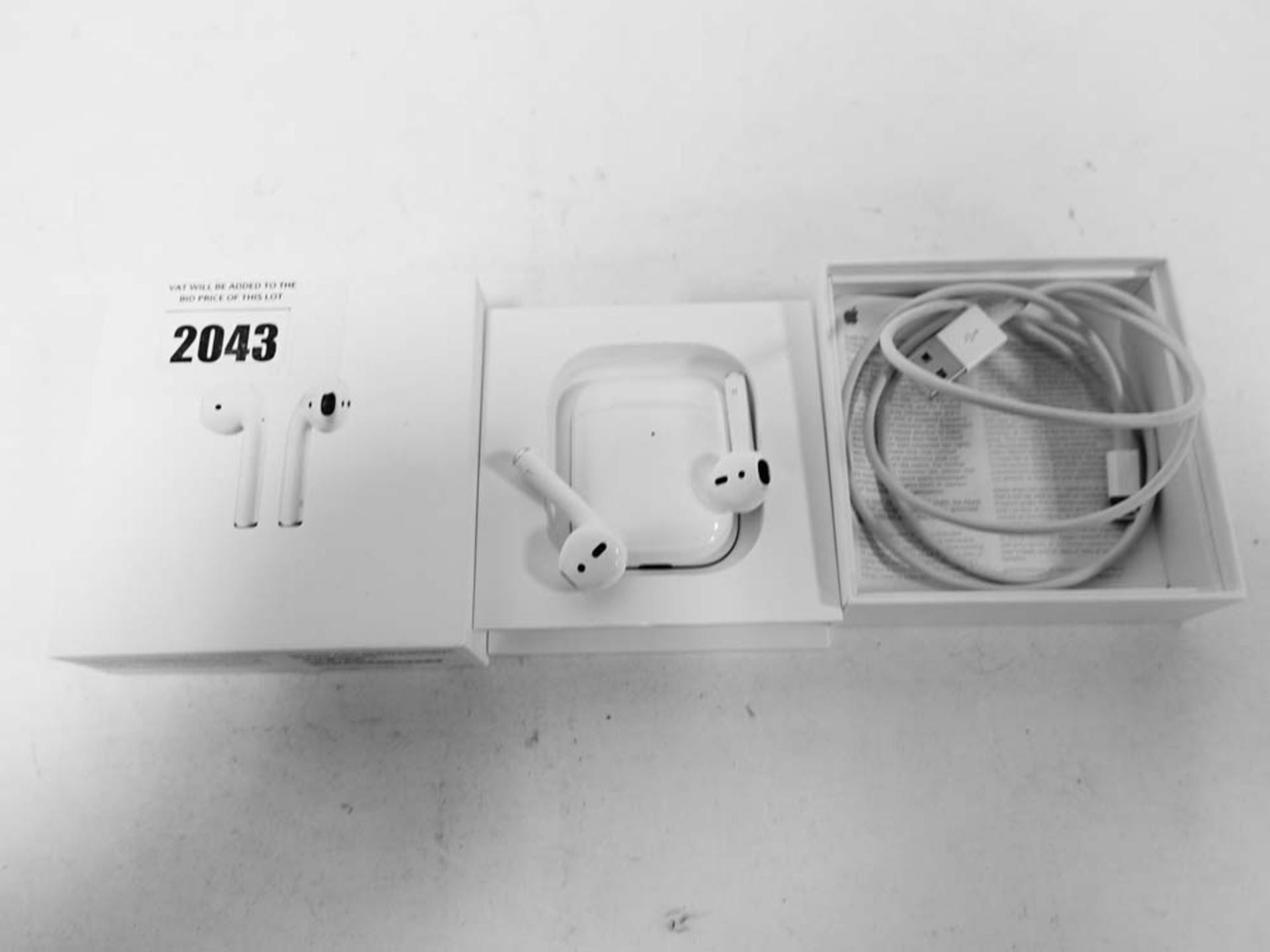 Apple 2nd generation Airpods with wireless charging case, Cable and box.