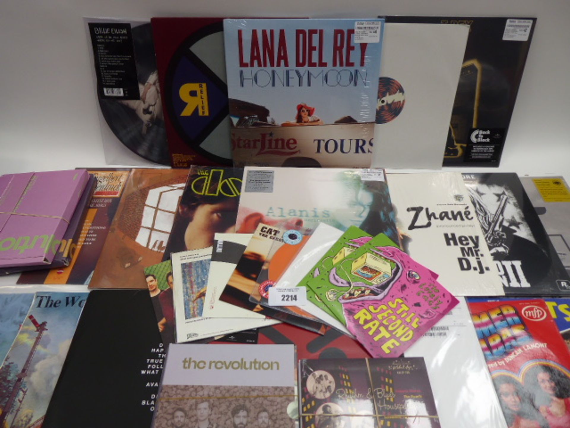Box containing LP and 45 records to include Bon Jovi, The Lovely Eggs, T.Rex, Lana Del Ray, Billie