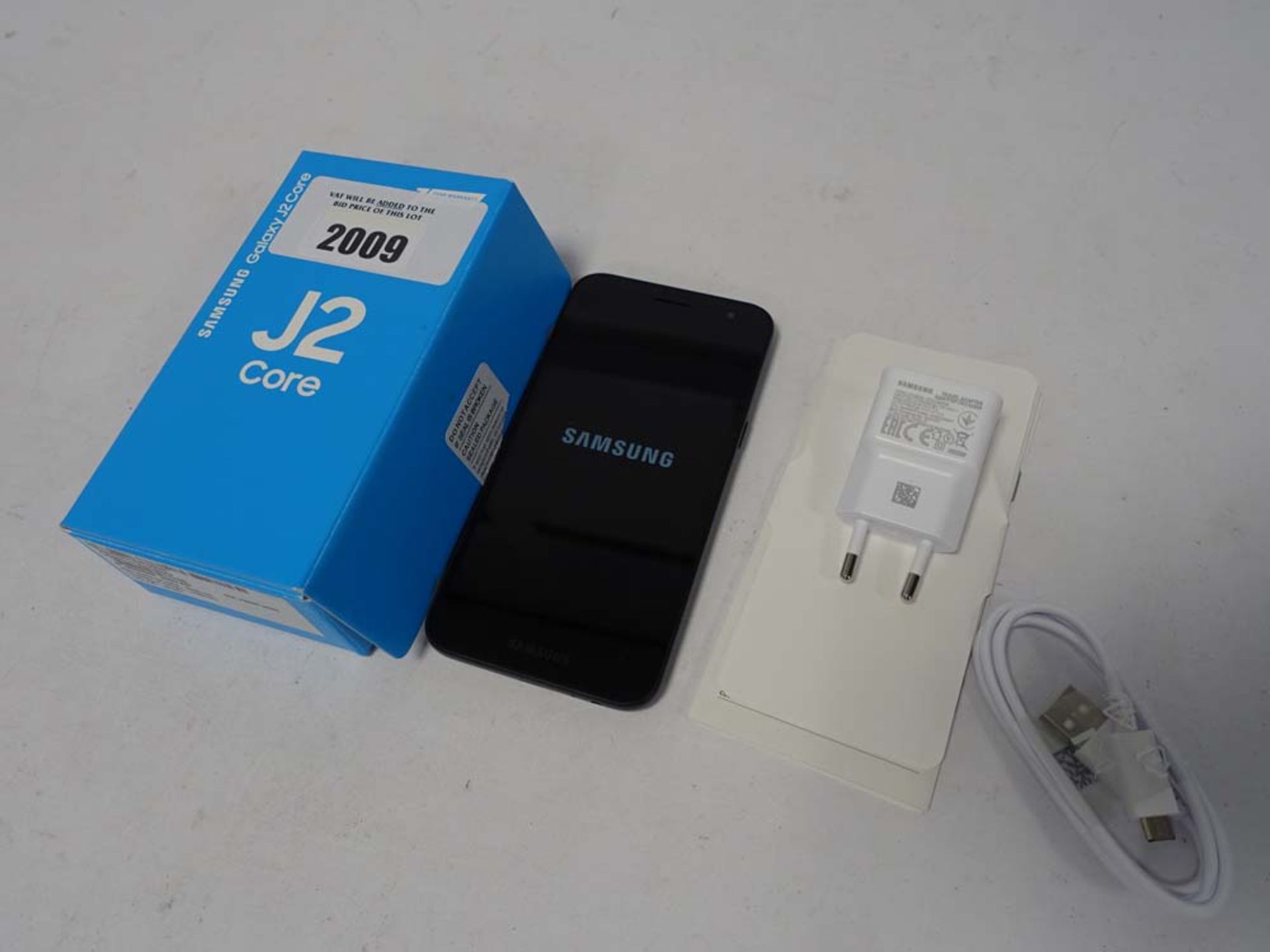 Samsung J2 Core 16gb mobile with 2pin charger and box.