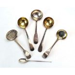 Six Georgian and later silver sifting spoons and ladles, various dates and makers,