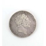 A George III silver crown, 1819, Laureate head right,