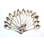 A collection of Georgian and later silver old English and other pattern dessert spoons,