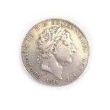 A George III silver crown, 1818, Laureate head right,