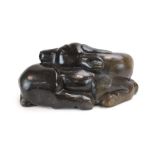 Damian Manuhwa (1952-2008), a soapstone figural group modelled as a sleeping deer, l.