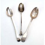 Three Georgian and later silver serving spoons, various patterns, dates and makers,