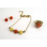 A 9ct yellow gold fine chainlink necklace set three coral flowerheads,