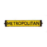 A 1950/60's yellow enamelled rotating 'Metropolitan' and 'District' sign, l.
