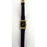 A ladies 18ct yellow gold manual wind wristwatch by Omega,