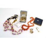 A small parcel of costume jewellery including a carnelian-type bead necklace, cufflink's,