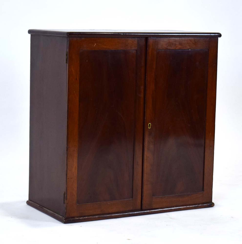 A 19th century mahogany table cabinet, the pair of doors enclosing an arrangement of twelve drawers, - Image 4 of 21