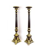 A pair of cast metal stands of Rococo design, later painted, h.