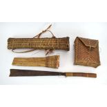 A Burmese knife with a bamboo and rattan bound handle,