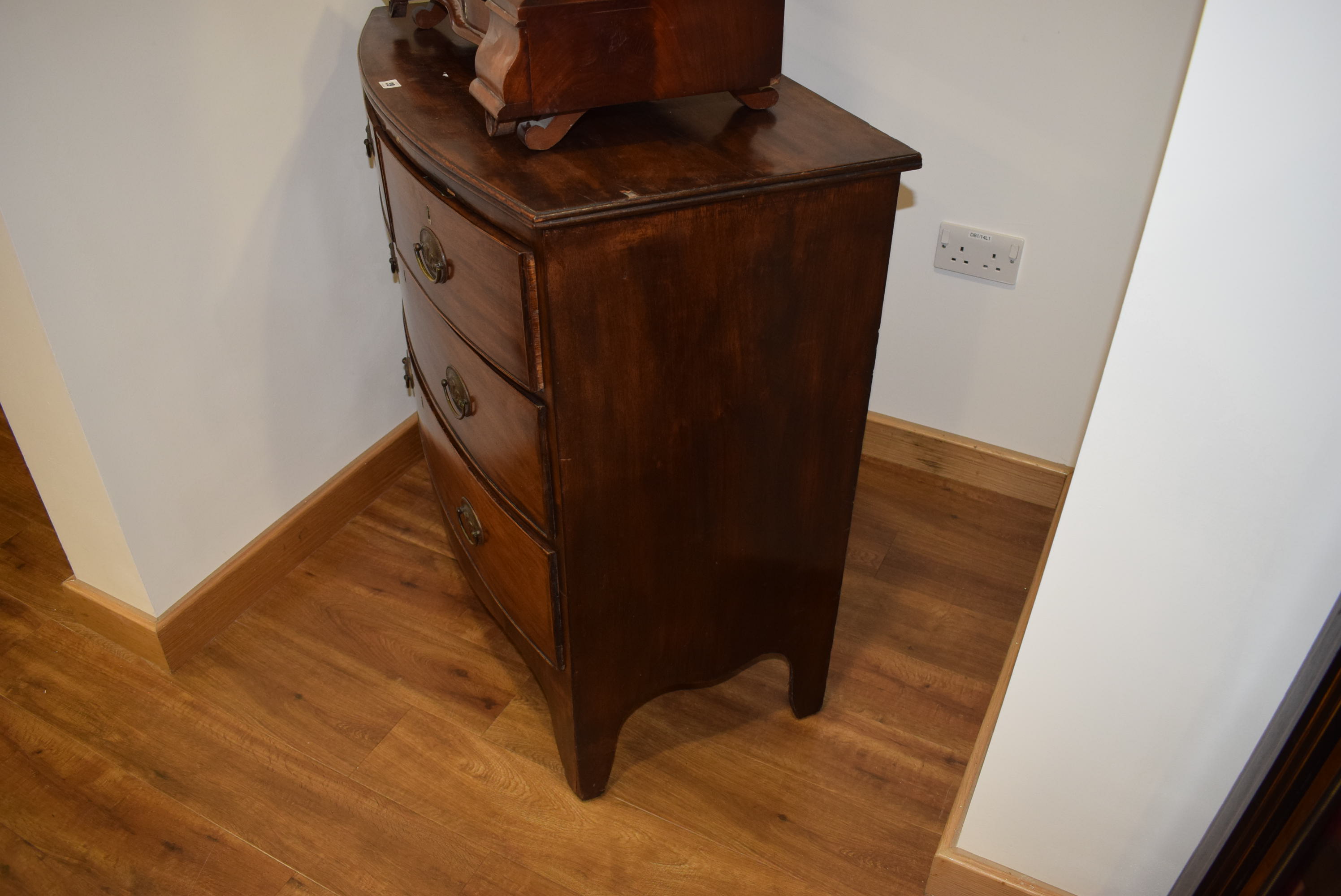 A 19th century mahogany bow fronted chest of two over two drawers on splayed feet, w. - Image 3 of 18