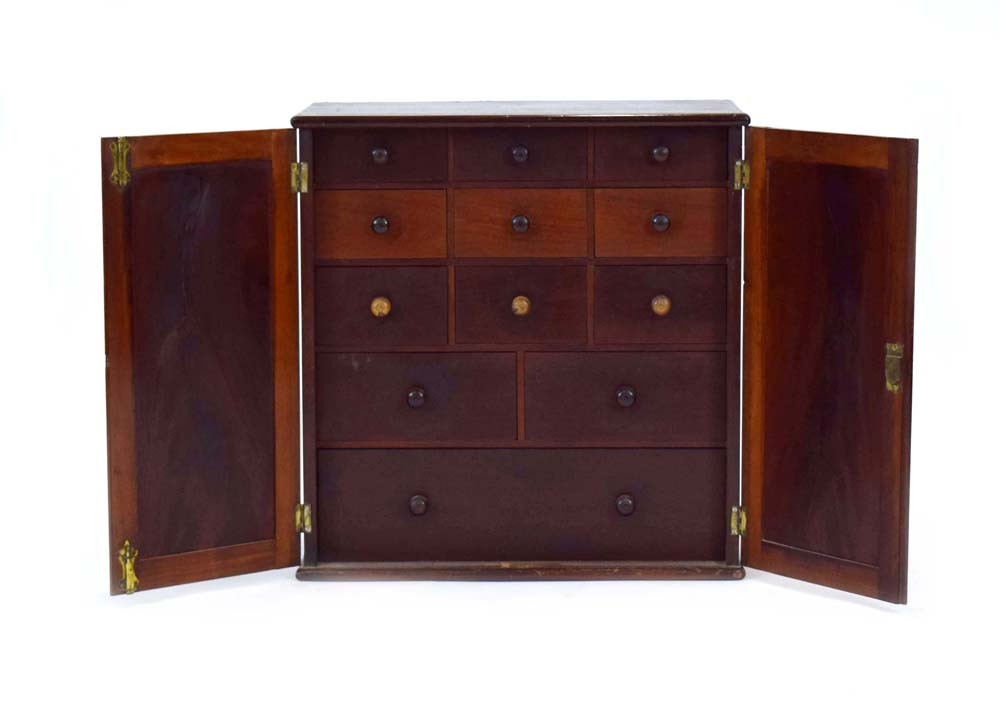 A 19th century mahogany table cabinet, the pair of doors enclosing an arrangement of twelve drawers, - Image 2 of 21