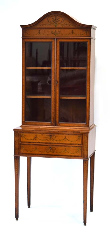 A late 19th century Sheraton Revival cabinet on stand by Edwards & Roberts,