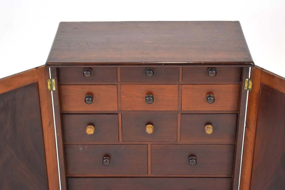 A 19th century mahogany table cabinet, the pair of doors enclosing an arrangement of twelve drawers, - Image 3 of 21