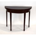 A George III mahogany and strung card table on square tapered inlaid legs, w.