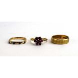 A 9ct yellow gold half eternity ring of square form set four small sapphires interspersed with
