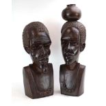 A pair of Tribal figural hardwood carvings modelled as busts, max. h.