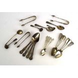 A mixed parcel of Georgian and later silver teaspoons, salt spoons and sugar nips,