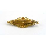 An early 20th century 15ct yellow gold brooch of marquise form set small rose cut diamond in a