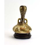 A Satsuma miniature bottle vase typically decorated with figures at leisure, h.