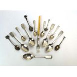 A mixed parcel of silver comprising five fiddle pattern teaspoons, four demitasse spoons,