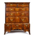 A George II walnut, oak and crossbanded chest on stand,