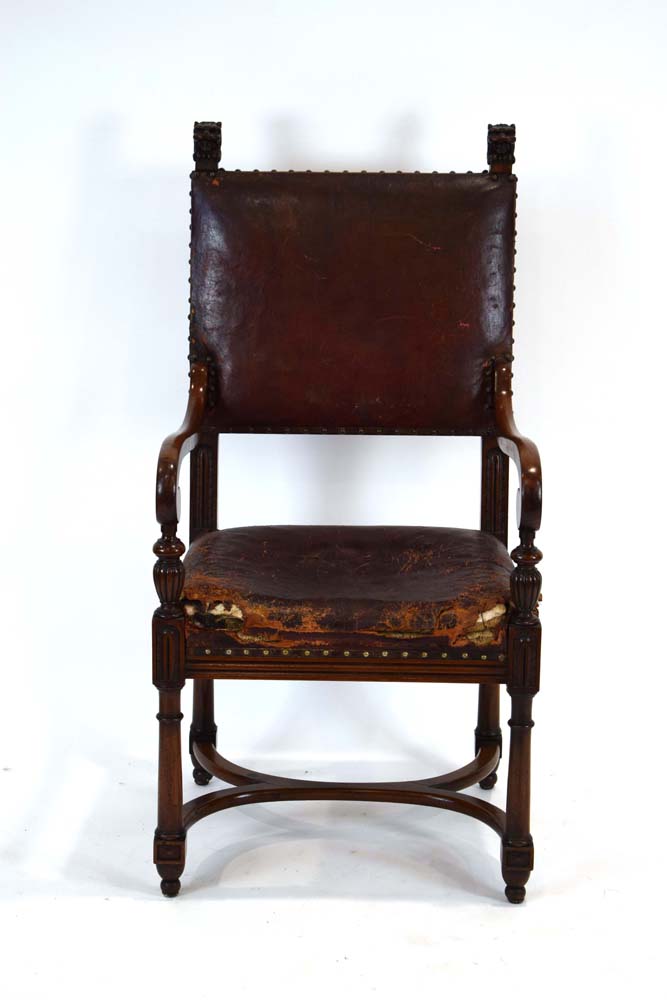 An early 19th century mahogany library chair,