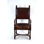 An early 19th century mahogany library chair,