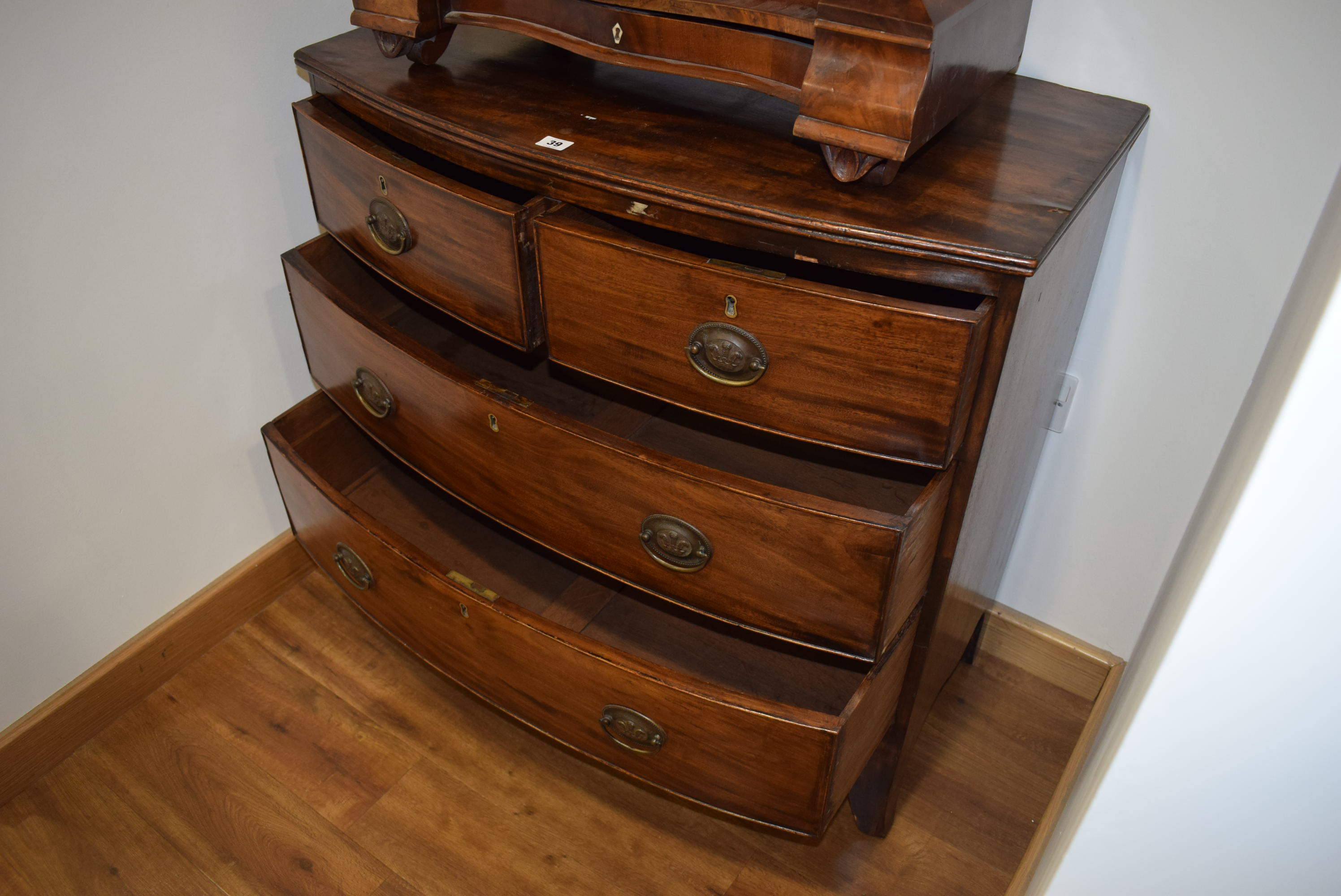 A 19th century mahogany bow fronted chest of two over two drawers on splayed feet, w. - Image 15 of 18