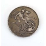 A George IV silver crown, 1821, Laureate head right, George slaying the dragon,